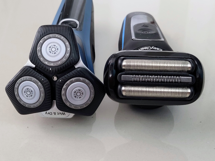 Braun Series 5 and Philips Series 5000 shaver facing forwards displaying their shaving elements