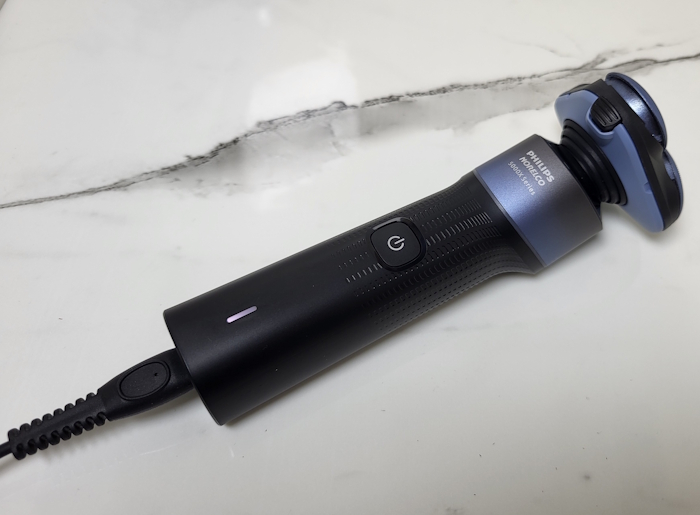 Philips 5000X Shaver on charge with cord attached