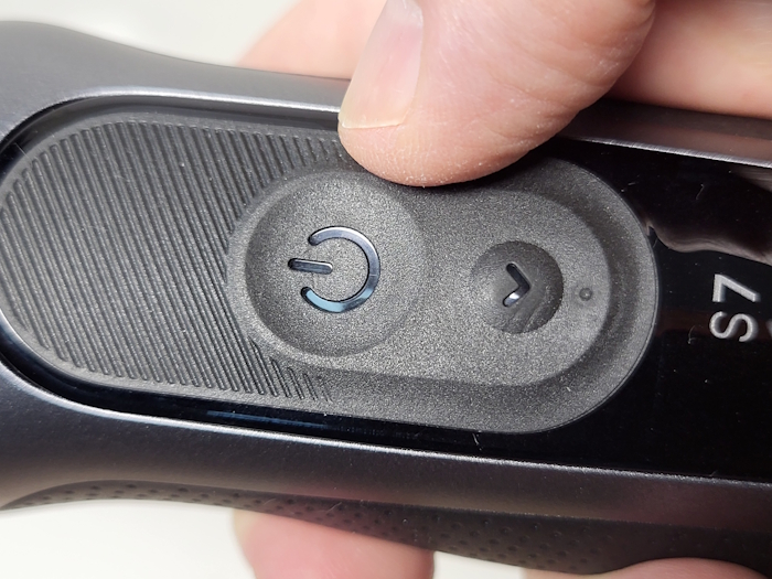button and thumb grip area of the Braun S7