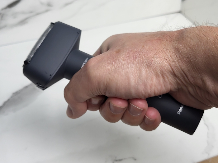 holding Panasonic ES-RM3B ARC 3 shaver