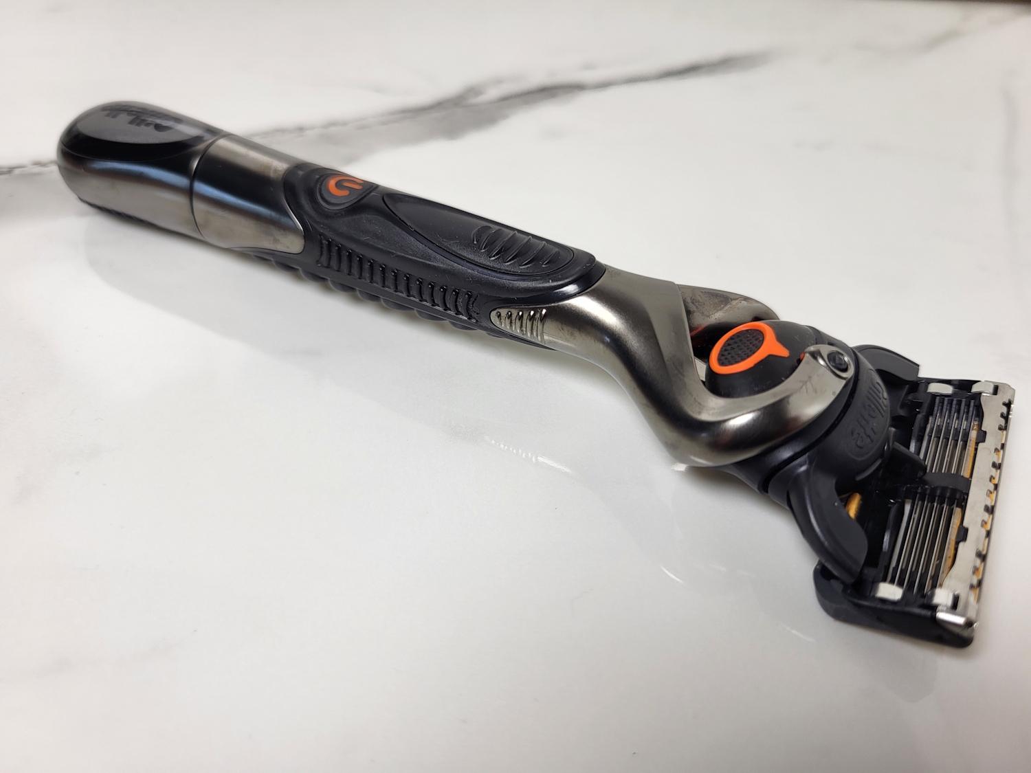 Gillette Proglide Power laid down displayed with marble background