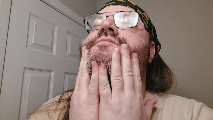 Robert using and applying the SheaMoisture Beard Conditioning oil