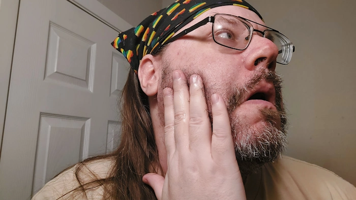 Robert using and applying the SheaMoisture Beard Conditioning oil