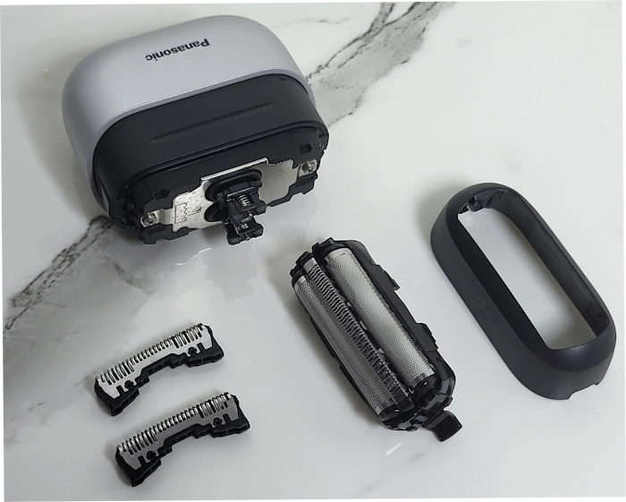 Panasonic ES-CM3 cassette and blades removed and next to the shaver