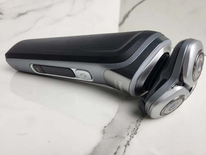 Philips i9000 Prestige laid down with marble background