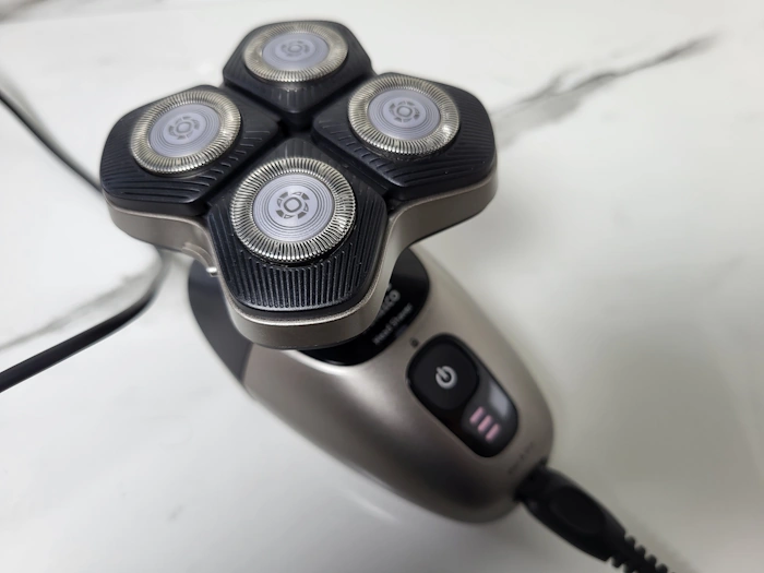 Philips Head Shaver Pro 9000 Series on charge and plugged in