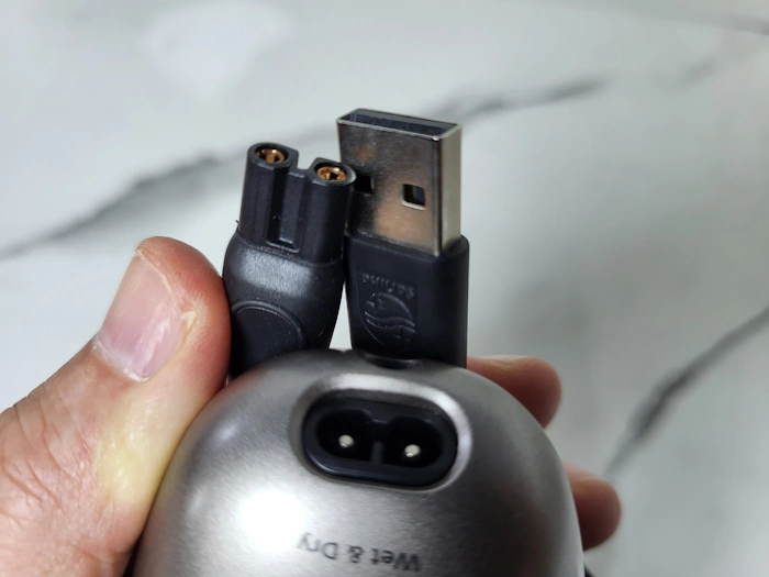 Philips Head Shaver Pro 9000 Series USB type a cable next to the socket on the shaver