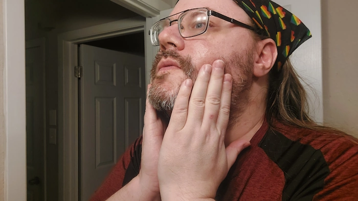 Robert massaging Scotch Porter Beard Oil into his beard