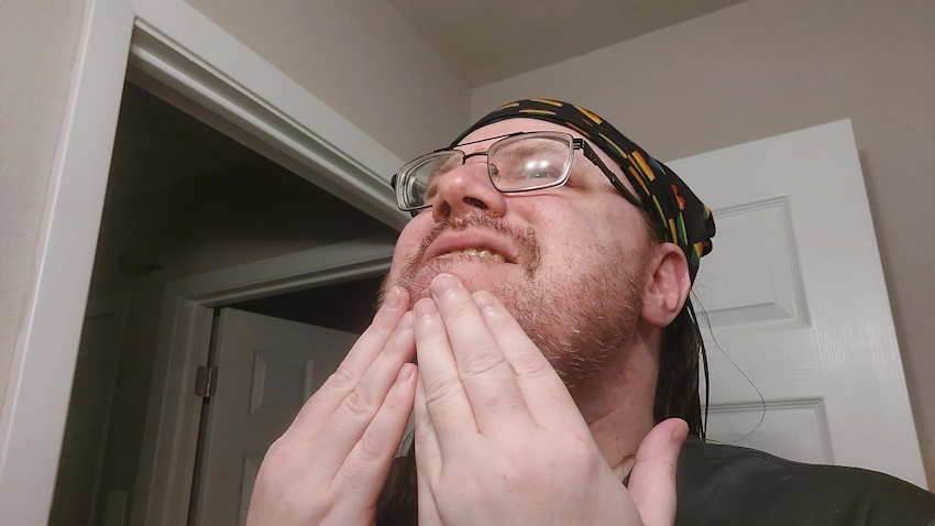 Robert applying Manscaped Beard Oil