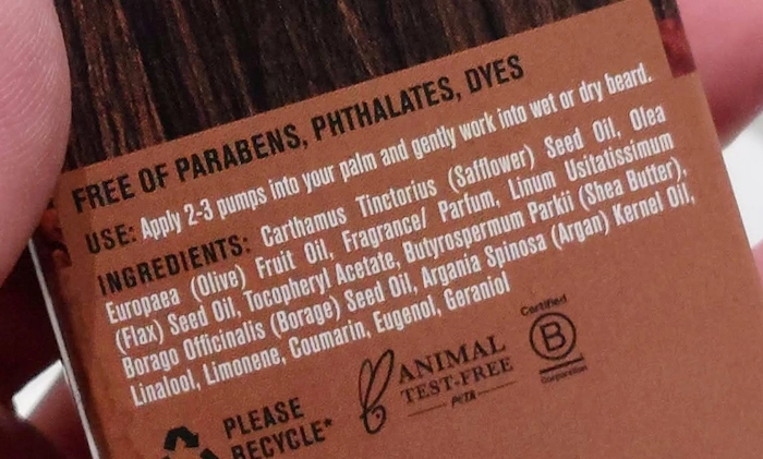 close up displaying the ingredients on the back of the Every Man Jack Aged Bourbon Beard Oil box