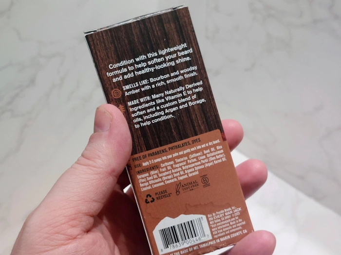 displaying the writing on the back of the Every Man Jack Aged Bourbon Beard Oil box displaying the writing on the back of the Every Man Jack Aged Bourbon Beard Oil box