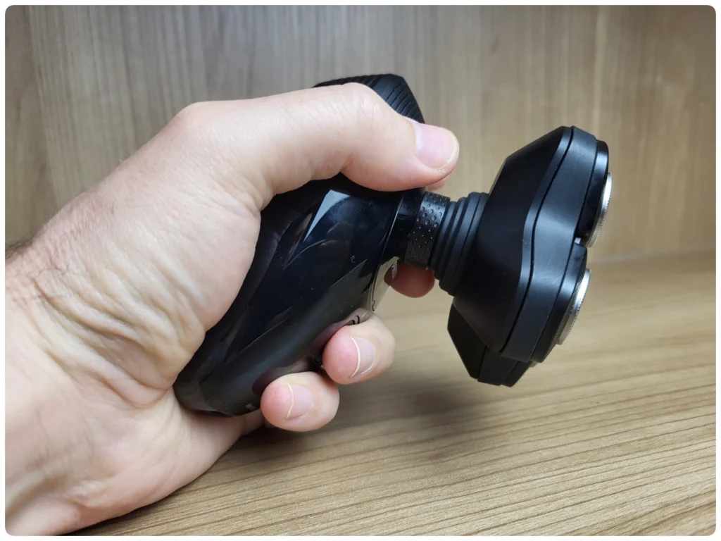holding the Philips Head Shaver Pro 5000 Series