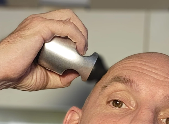 head shaving with Aberlite Touch 2 close up