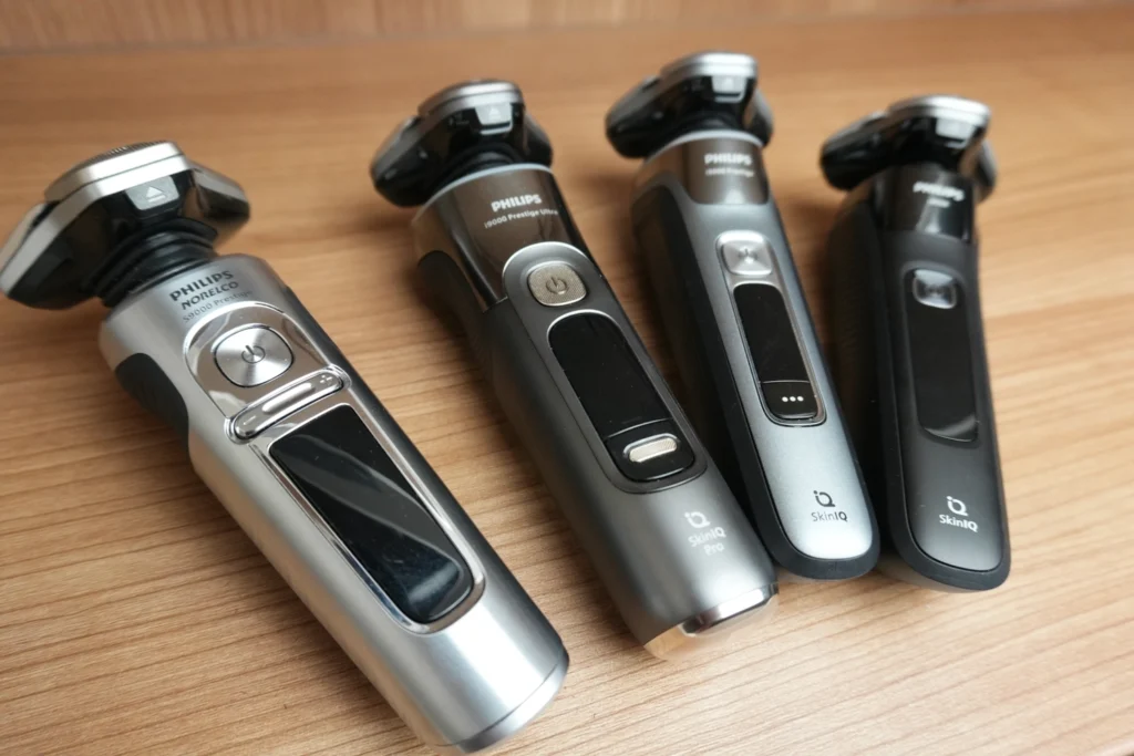 three Philips i9000 shavers and S9000 Prestige in a row
