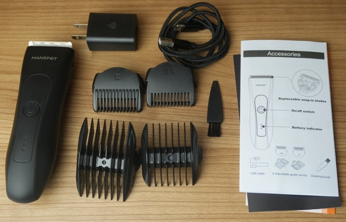Manspot groin and body trimmer unboxed with all components laid out
