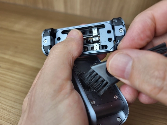 cleaning the Laifen P3 Pro with a brush