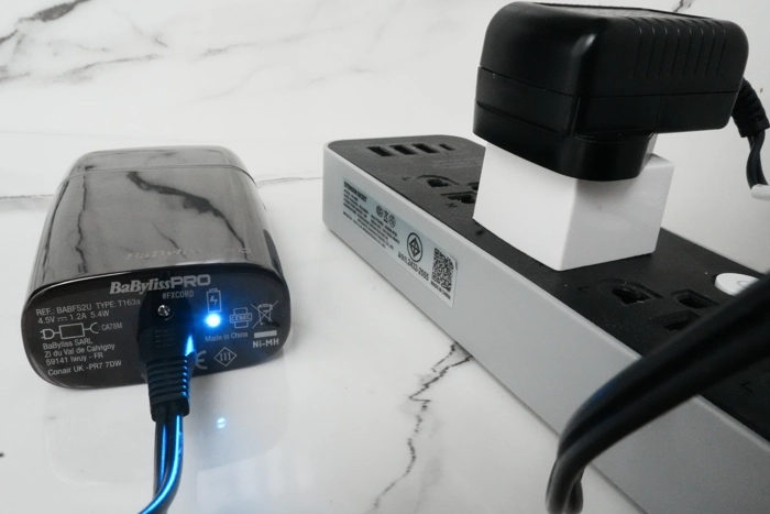 Babyliss Pro Twin Foil Shaver on charge with LED lit up