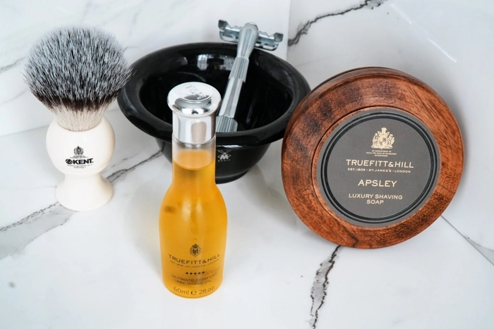 Truefitt and Hill Comfort Pre Shave Oil displayed with other shaving supplies