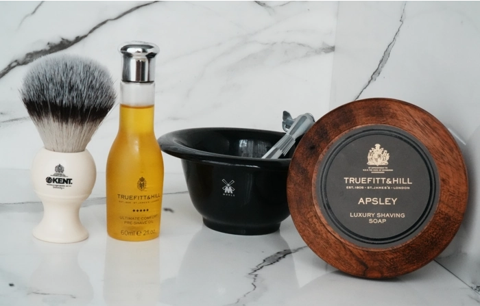 Truefitt and Hill Aspley Shaving Soap in Bowl displayed next to other shaving supplies