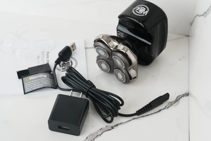 Skull Shaver Palm Pro MX5 unboxed with all components laid out