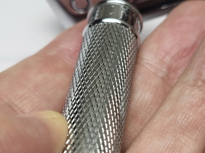 close up of Muhle R89 engraved handle grip